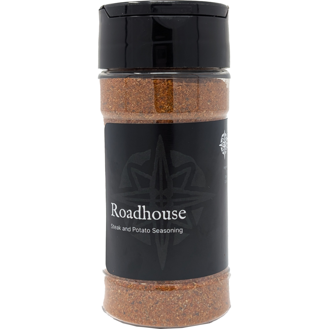 A 6 oz jar of Origin Trade Goods Roadhouse Spice Blend, a bold and savory blend that goes well on almost anything.