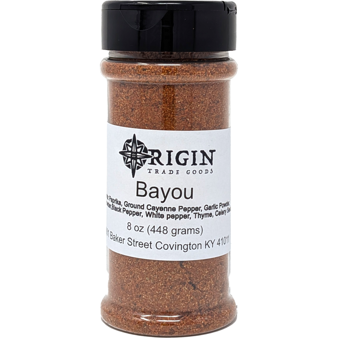 A 4 oz jar of Origin Trade Goods Bayou Spice Blend, a bold and flavorful blend of Cajun spice, perfect for gumbo and jambalaya or for seasoning some chicken or seafood.