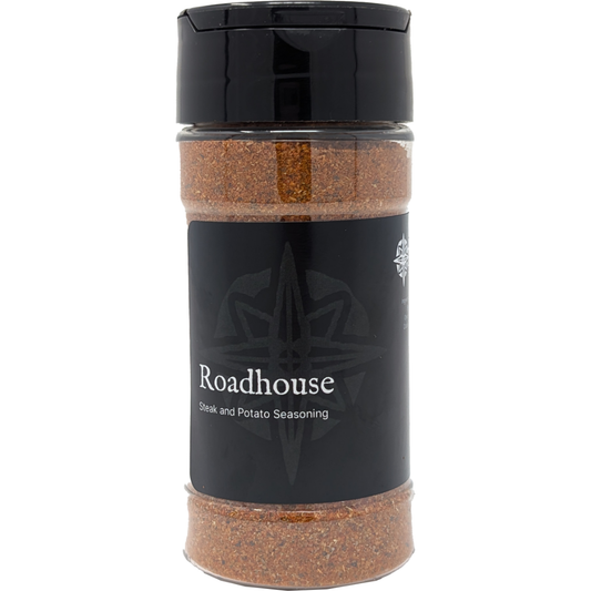 A 6 oz jar of Origin Trade Goods Roadhouse Spice Blend, a bold and savory blend that goes well on almost anything.