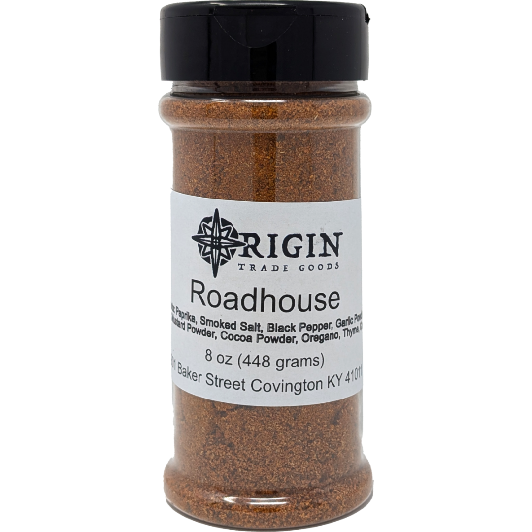 A 6 oz jar of Origin Trade Goods Roadhouse Spice Blend, a bold and savory blend that goes well on almost anything.